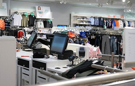 Retail staff using AIDC mobile computers and RFID devices